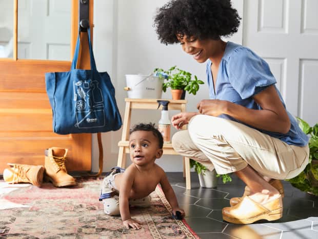 Woman and baby on floor