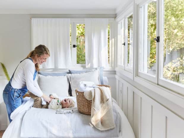 Woman and child on bed