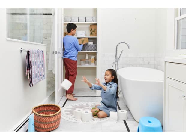 Children playing in bathroom