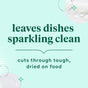A light green ad by Seventh Generation for their USDA-certified biobased Liquid Dish Soap boasts: leaves dishes sparkling clean and cuts through tough, dried-on food. It features sparkles, a circular soapy water image, and is made with essential oils.