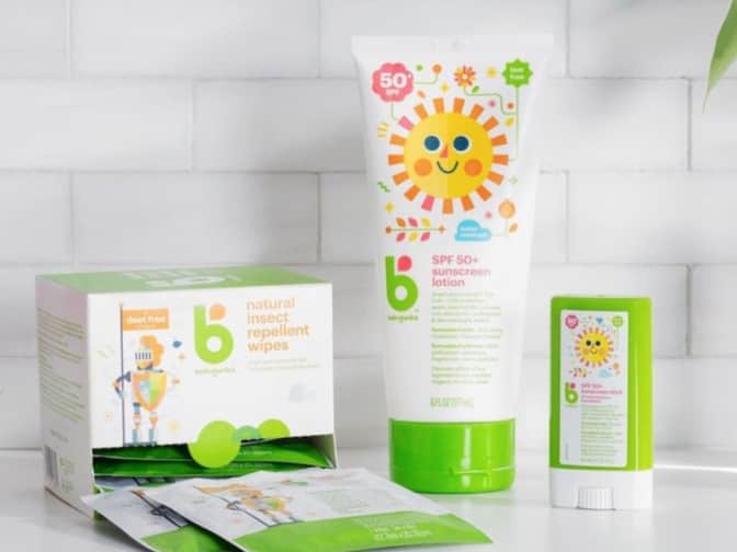 Babyganics sunscreen tube and mini sunscreen stick displayed on a counter
