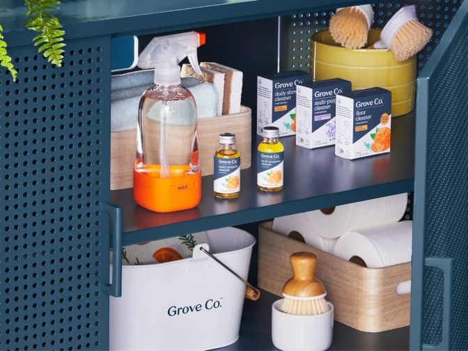glassware containers arranged aesthetically on two shelves