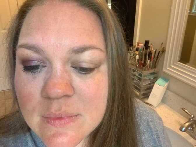 After photo of woman with makeup removed.