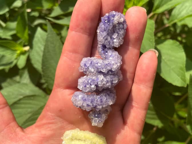 Image of Borax crystals in hand