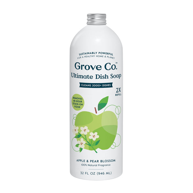 The 32 fl oz white bottle of Grove Co. Ultimate Dish Soap - 2 Refills, with apple and pear blossom design, cleans 2000+ dishes with plant-based ingredients and removes 48-hour stuck-on food. It features recyclable packaging and a 100% natural fragrance.