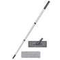 The Grove Co. Compact Microfiber Mop is shown, featuring a gray adjustable telescopic handle. It includes a rectangular base with a swivel joint and a detachable microfiber pad, crafted from recycled materials for efficient cleaning.