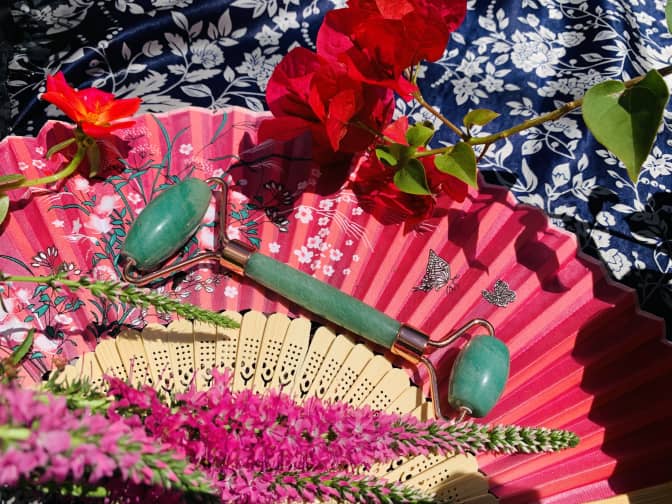 Photo of jade roller on traditional Chinese fan