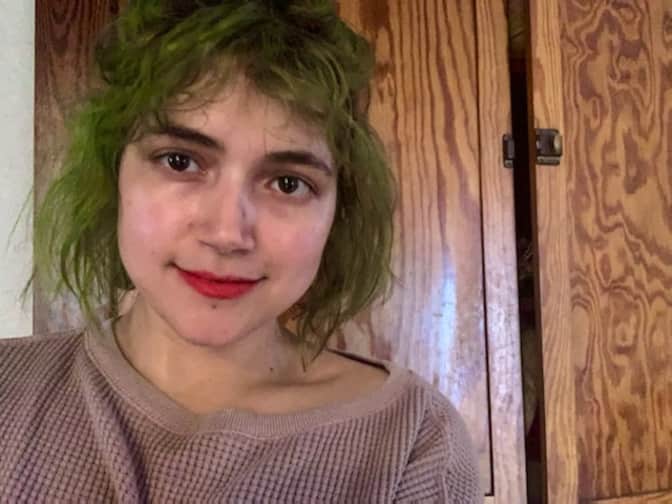 Photo of woman wearing lipstick