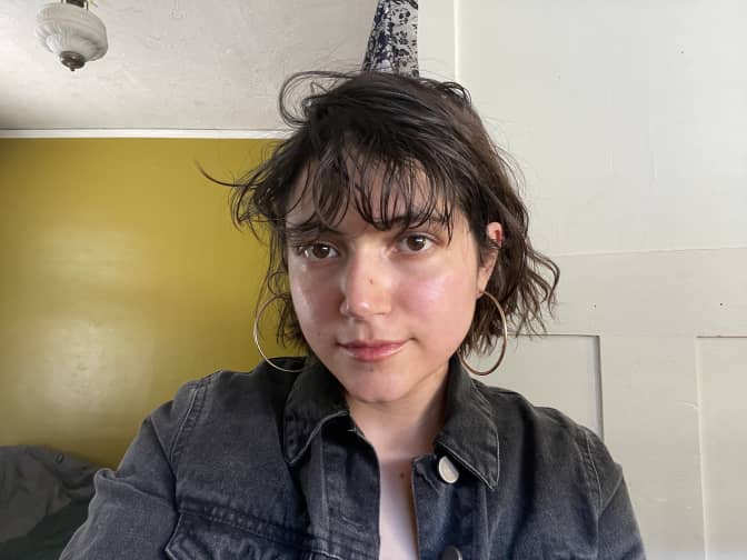 Image of writer with Pai Rosehip Oil applied