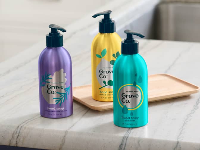 Grove Co. hand soap sitting on a countertop.
