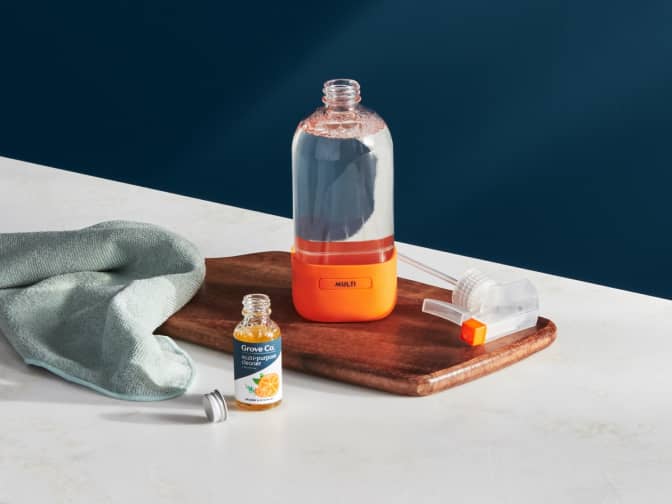Grove Co. glass spray bottle on counter