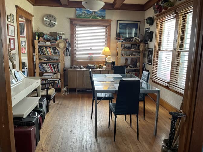 A photo of hardwood floors before they've been cleaned.