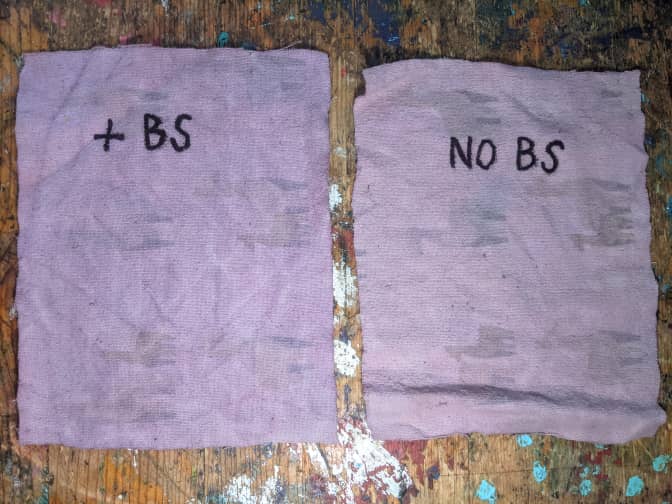 Image of 2 pieces of cloths stained with red wine