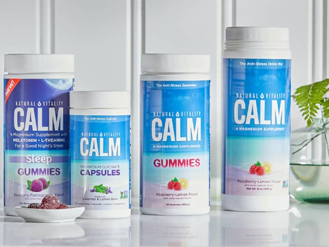 Image of 4 CALM gummy jars in a row on counter