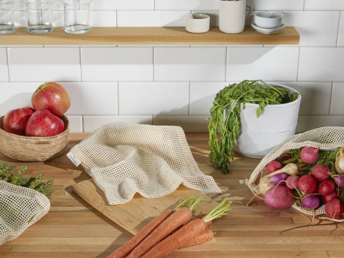 Mesh produce bags with produce on countertop