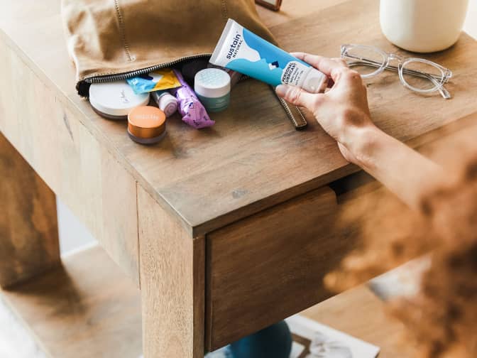 Photo of Sustain lubricant and other products on table