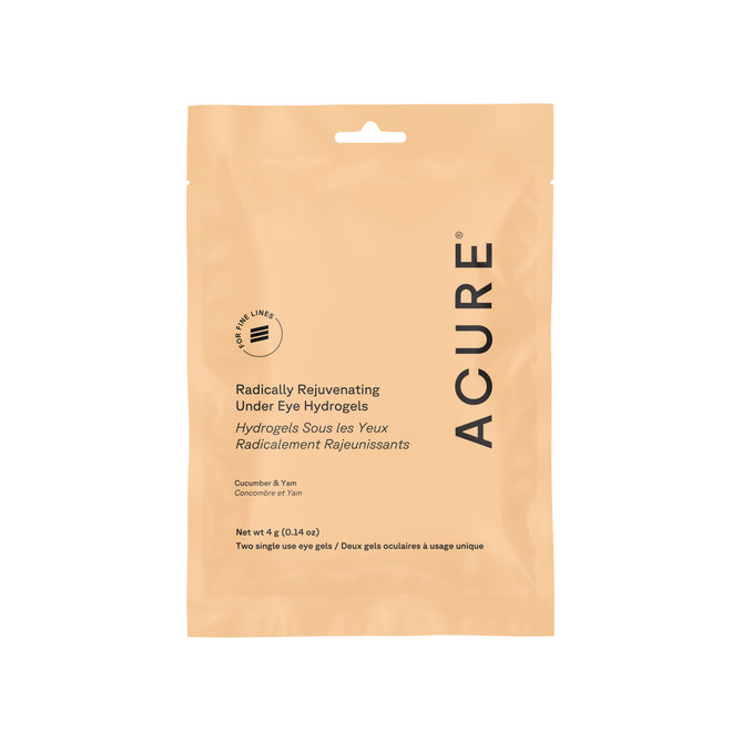 The Acure Radically Rejuvenating Under Eye Hydrogel Mask is packaged in beige with a Leaping Bunny logo. It features hydrating cucumber and yarrow, contains two single-use eye gels, and has a minimalist design with black product details.