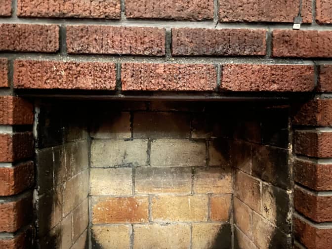 fireplace being cleaned with soap, vinegar and baking sodas