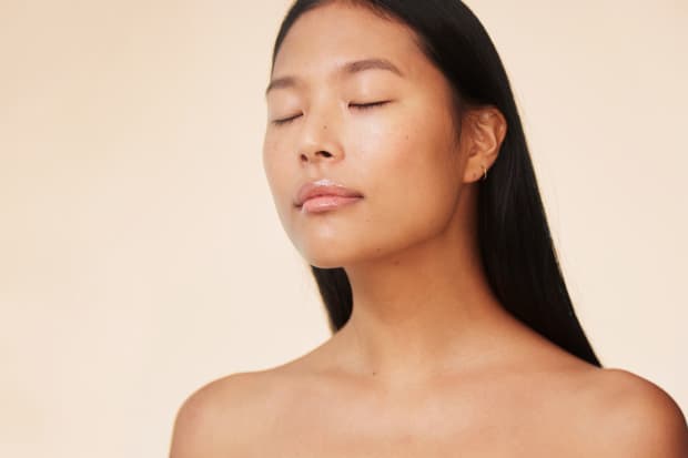 Potrait of woman with eyes closed