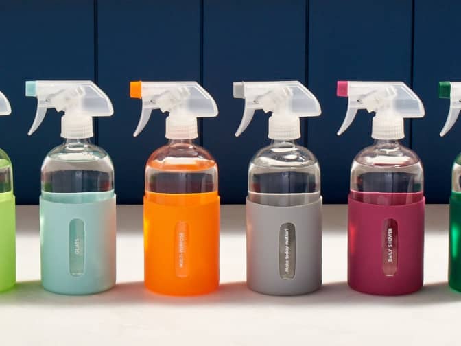 Image of reusable Grove Co. glass spray bottles lined up